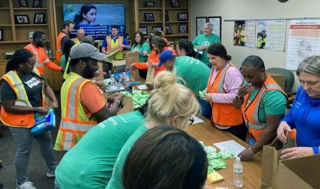 IP volunteers pack hygiene kits